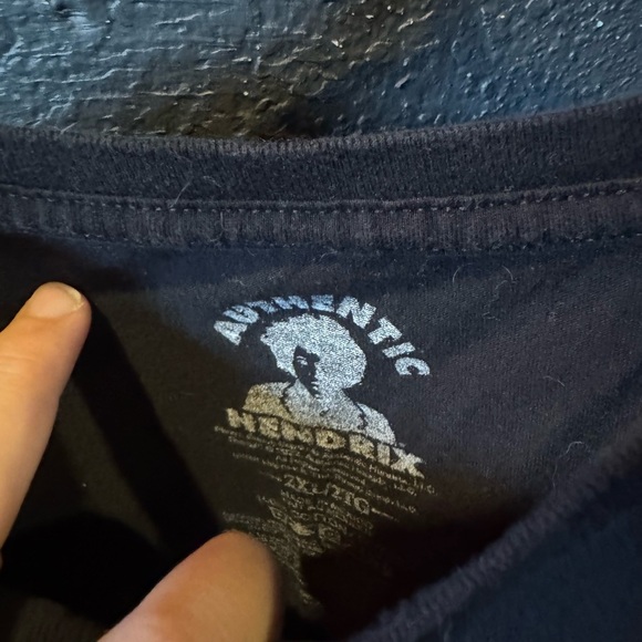 Black Graphic Tee with Iconic Design - Picture 2 of 3